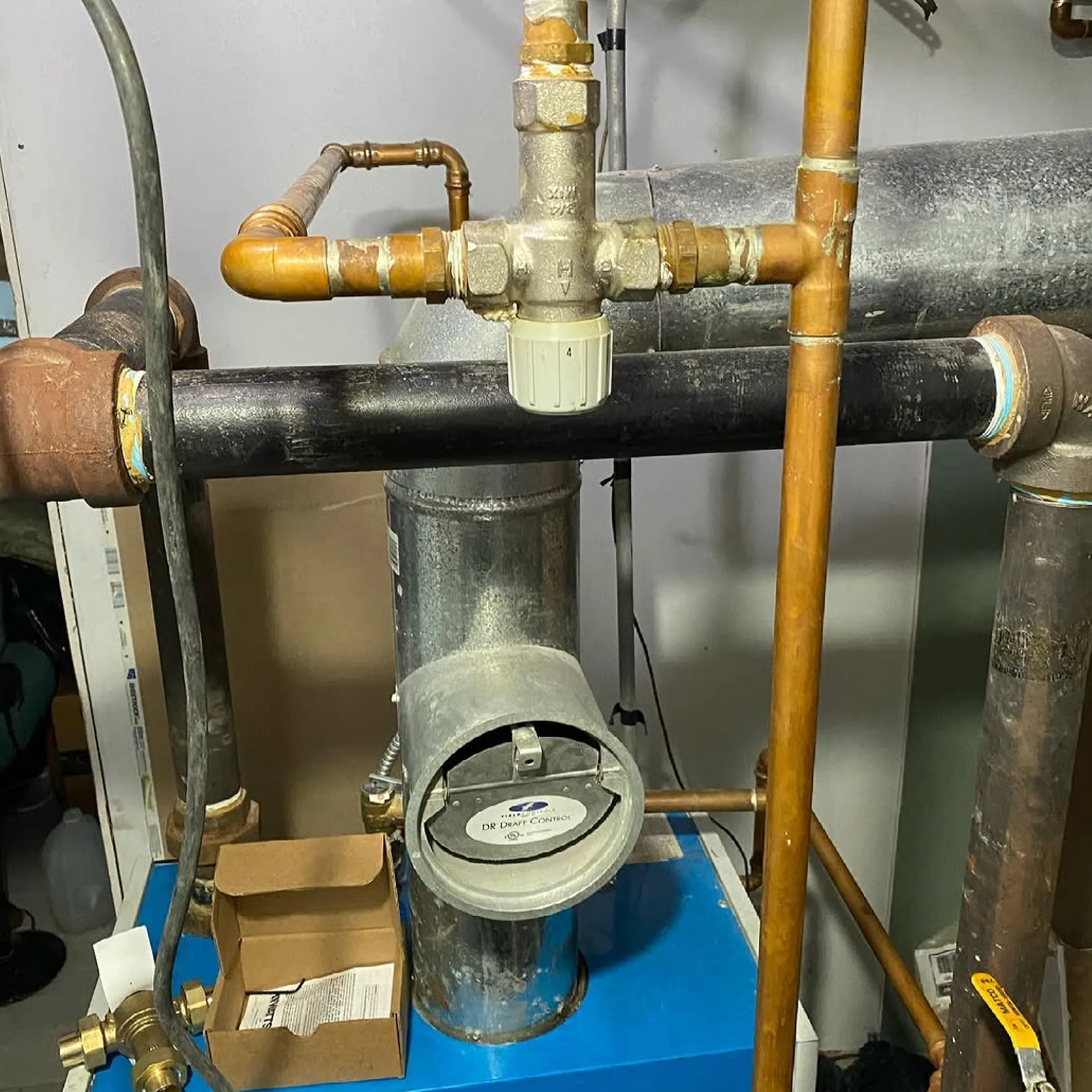 tempering valve with hot water pipes