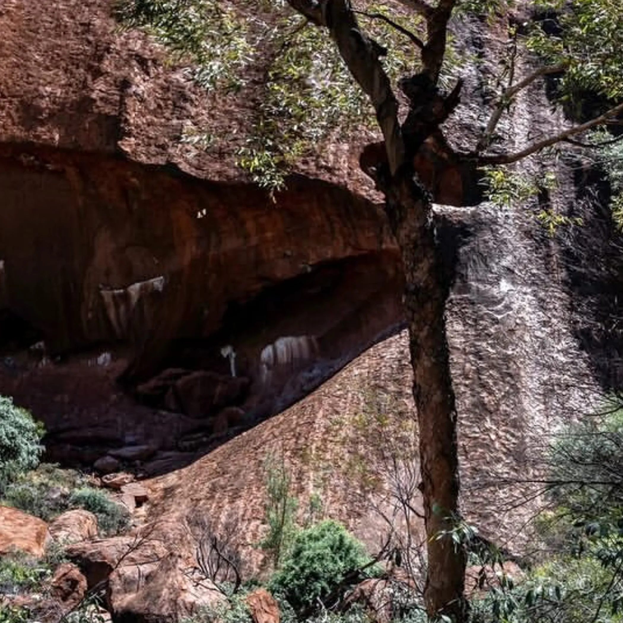 mutitjulu waterhole surrounded by rocks