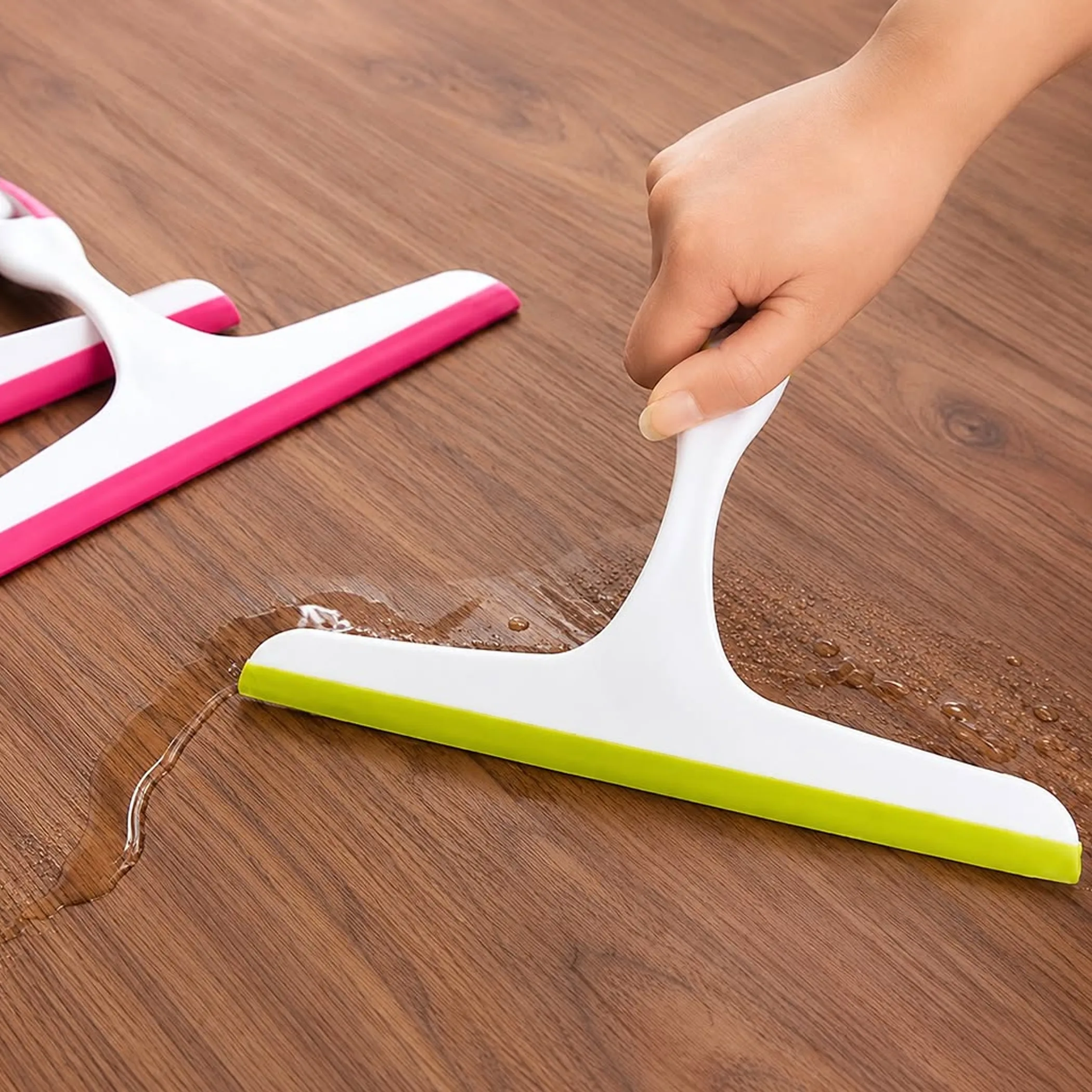 clear squeegee cleaning glass surface